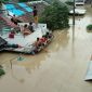 Jakarta flooding flood 2430 sinking victims were kampung pulo not evacuated hundreds floodwaters rise displaced tangerang roll american turn away