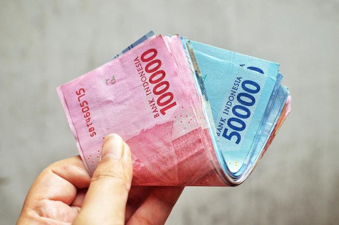 Ilustrasi Bantuan Subsidi Upah (foto: Getty images )