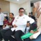 Wakil Walikota Tangerang Maryono Hasan saat menyapa warga berkaitan dengan optimalisasi pelayanan dari RT RW (foto:ist)